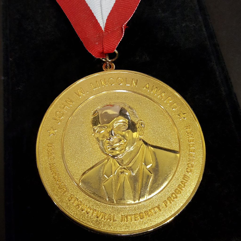 Photograph of the John W. Lincoln Award medal at the USAF ASIP Conference